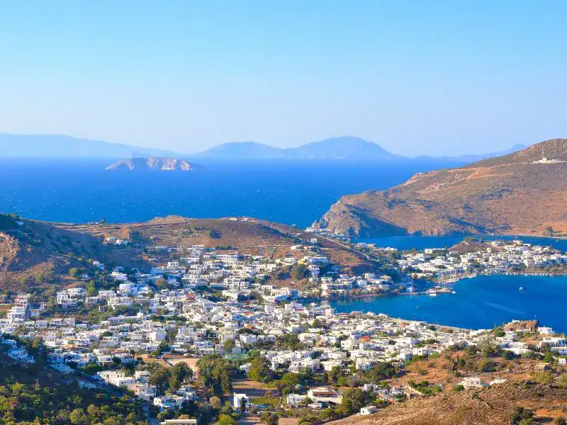 realistic view from afar of Patmos island main city
